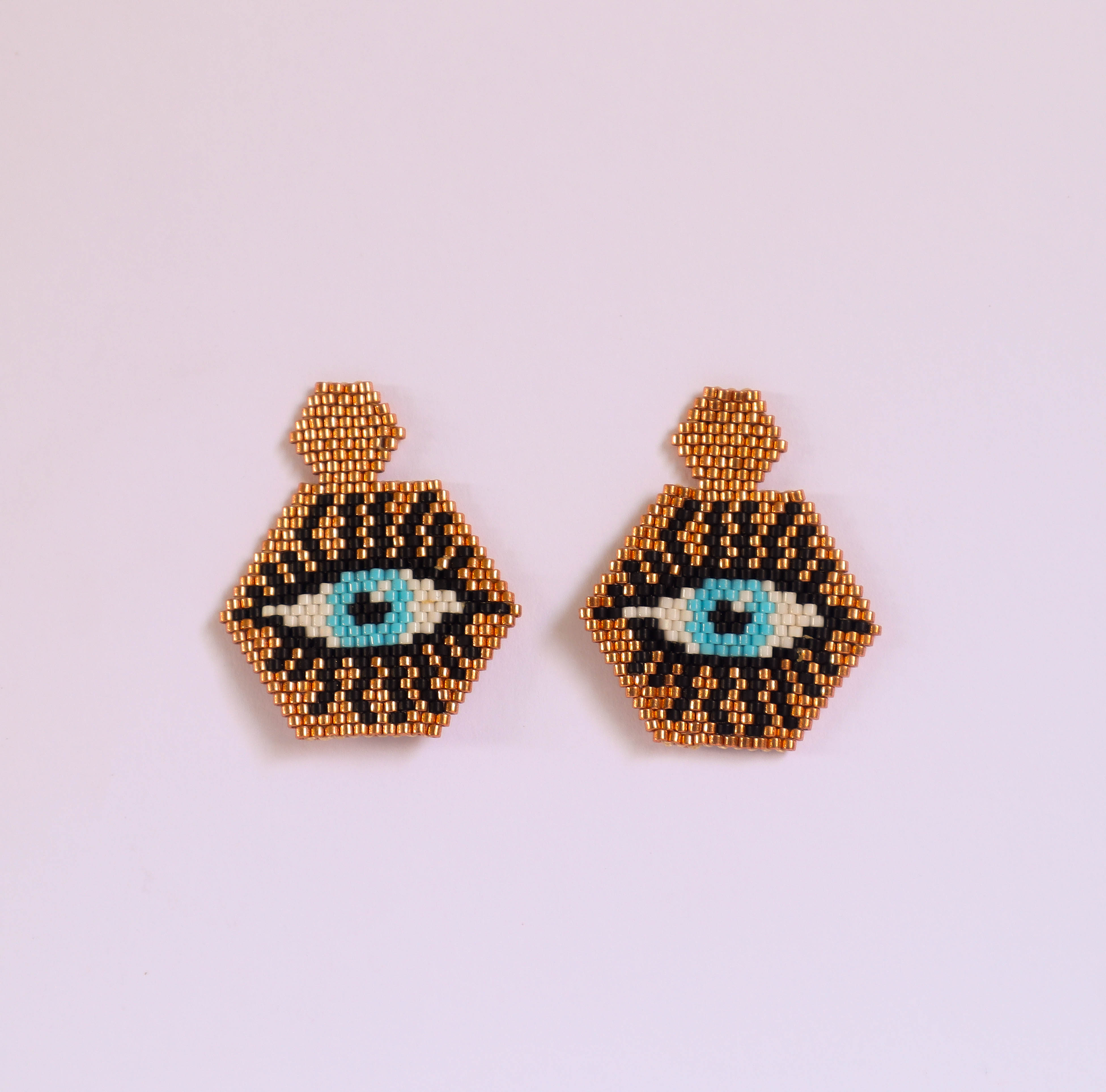 ARETES HEXAGONO OJO REAL