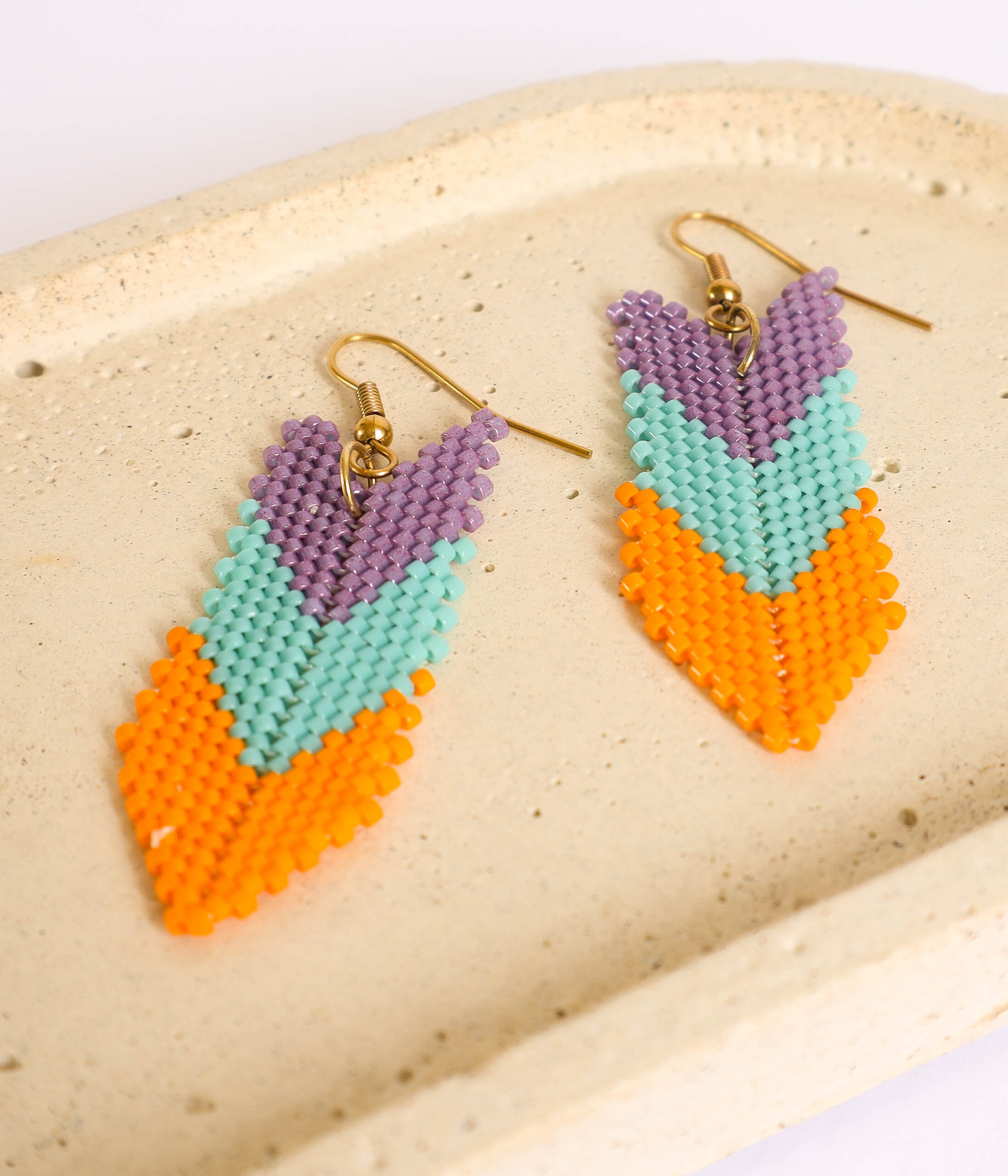 ARETES COLA PESCADO